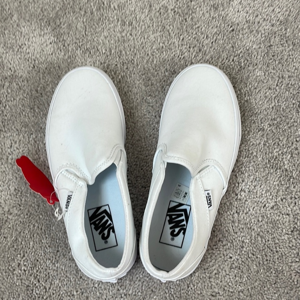 White slip on vans